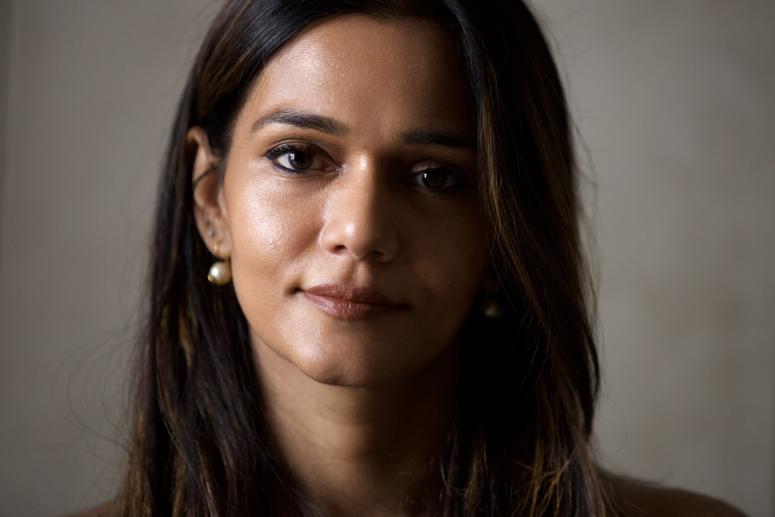 Portrait of a woman against dark background - Inner Child Healer -captured by Shot By Agastya in Mumbai.